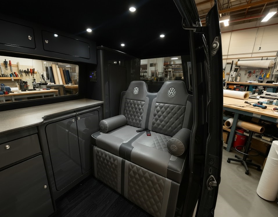 Rock n roll bed with VW logo black vinyl with grey Bentley stitch and matching VW bolsters Blue Note Upholstery